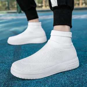 Breathable white knit sock sneakers for men and women on a blue athletic track