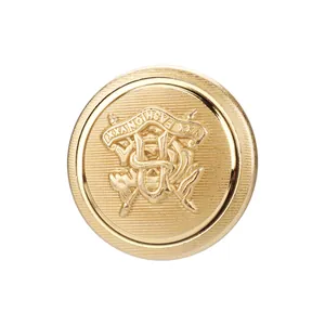 Premium gold brass metal button featuring embossed decorative emblem for fashion apparel