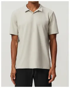 Front view detail of a light grey breathable cotton sports polo shirt for men.