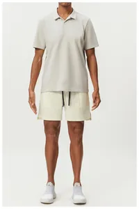 Front view of men's grey breathable sports Polo shirt and light beige casual shorts