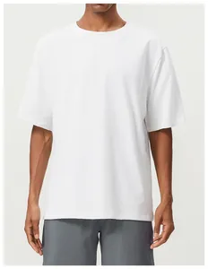 Close-up of a men's white oversized cotton t-shirt for fitness and casual wear