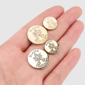 Premium gold metal blazer buttons with traditional crest engraving for women's tops
