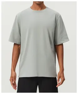 Front view detail of a breathable cotton sports T-shirt for men in light gray color