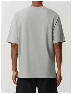 Detailed rear view of a breathable grey cotton sports t-shirt for men, minimalist athletic style.