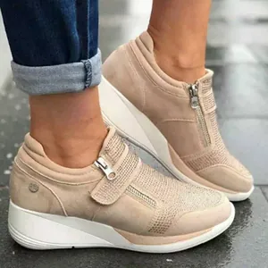 Stylish women's beige wedge sneakers with rhinestones and side zipper details