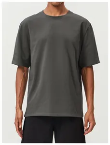 Detail front view of a breathable charcoal gray men's athletic cotton t-shirt