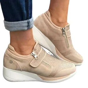 Elegant beige womens wedge sneakers featuring sparkling rhinestones and side zipper