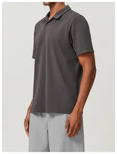 Side view showing the fit of charcoal grey loose breathable cotton sports Polo shirt