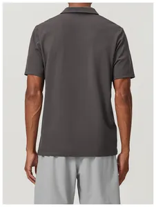 Back view showing the fit and breathable fabric of a charcoal grey men's sports polo shirt