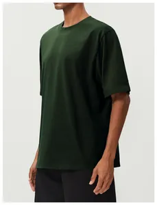 Detailed view of a dark green men's pure cotton sports t-shirt with a relaxed, breathable fit