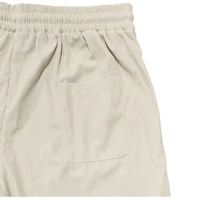 Macro view of vintage corduroy shorts showing textured fabric and side pocket detail