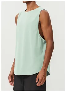 Men's breathable mint green cotton sports tank top shown in a relaxed athletic fit