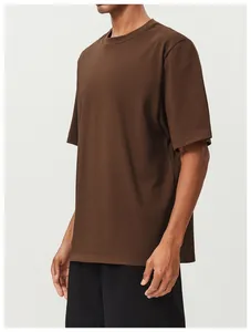 Detailed macro view of the fabric texture on a brown cotton men's sports t-shirt