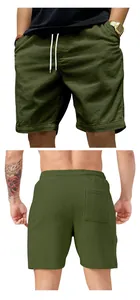 Detail showing front and back views of men's olive green corduroy cargo shorts.