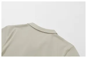 Close-up of breathable fabric and ribbed collar on this athletic sports polo shirt