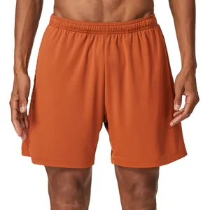 Men's quick-dry breathable mesh sports shorts in orange for running and gym training
