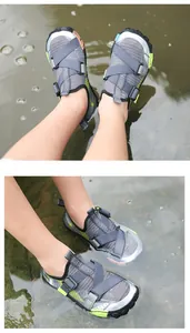 Detail view of quick-dry water shoes with adjustable cross straps for beach activities