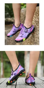 Side view detail of purple quick-dry water shoes with adjustable buckle straps for sports