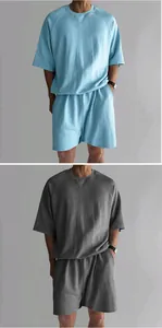 Ensemble deux pièces pour homme en tissu éponge bleu et gris avec manches raglan