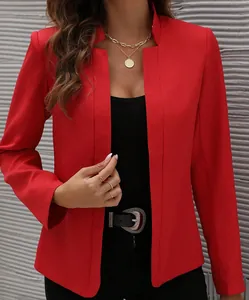 Close-up of a vibrant red open front blazer with a sleek minimalist collar design.