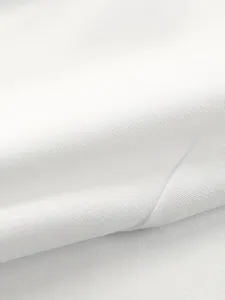 Macro view showing the detailed texture of high-quality white tribute silk fabric