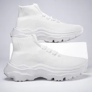 Detailed shot of white high-top knit sneakers featuring a chunky breathable sole design