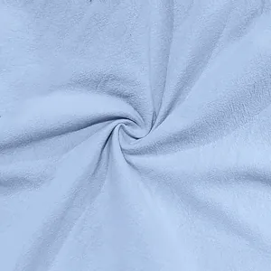 Macro-detail van lichtblauwe linnen stoftextuur van hoge kwaliteit met natuurlijke vezel