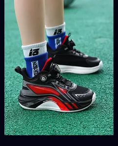 Side view of boy's black and red breathable basketball shoes with rotary buckle