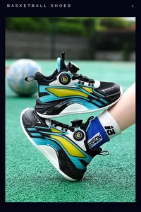 Detail view of boys' breathable basketball shoes with rotary buckle in blue and yellow.