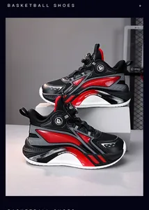 Detail view of boys' basketball shoes with red and black accents and dial lacing system