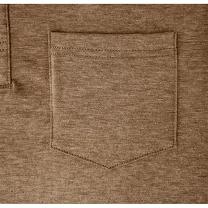 Close-up detail of a functional chest pocket on a brown men's cooling fabric Polo shirt.