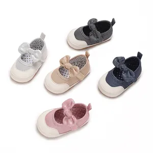 Collection of soft-sole baby girl pre-walking shoes with classic glitter bows in five colors