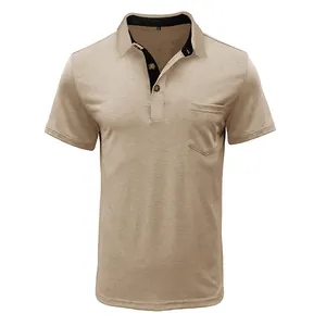 Close-up detail of a men's khaki polo shirt featuring a black collar and front pocket