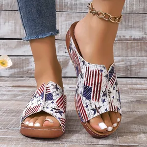 Detailed close-up of women's peep toe slippers featuring a patriotic American flag print