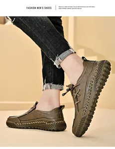Close-up of olive men's leather shoes with hand-stitched thick soles and casual style.