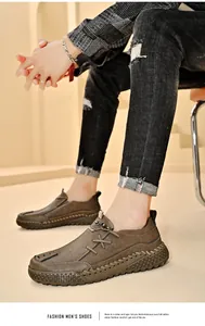 Close-up detail of brown hand-stitched casual leather shoes for men with thick sole.