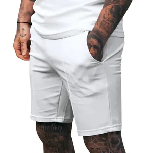 Close-up detail of white men's casual athletic shorts showing premium fabric and fit