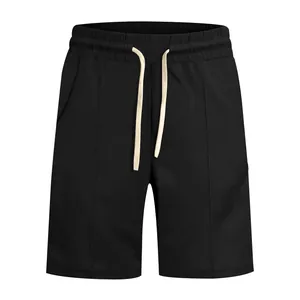 Detailed view of black ribbed casual golf shorts featuring an adjustable cream drawstring
