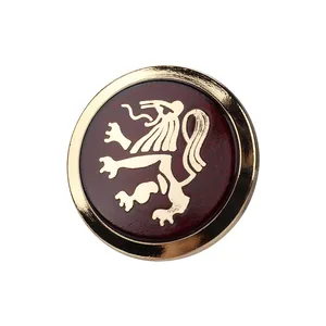 Vintage heraldic lion metal button with burgundy epoxy finish for elegant clothing.