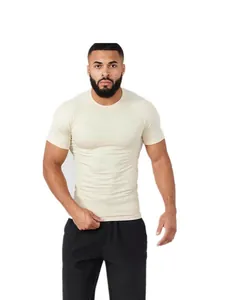 Men's beige compression fitness t-shirt designed for muscle training and bodybuilding