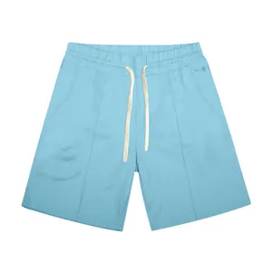 Light blue men's casual golf shorts with drawstring waist and vertical seam detail.