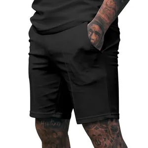 Close-up detail of men's black athletic shorts featuring side pocket and premium fabric