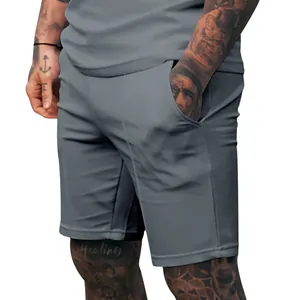 Close-up of men's grey pinstripe golf shorts with functional side pocket.