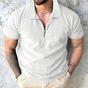 Close-up of men's white ribbed short sleeve polo shirt with half-zip collar detail