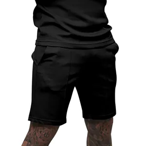 Detailed front view of men's plain black athletic shorts for fitness and casual wear