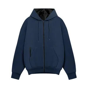 Detail view of a navy blue men's zip-up hoodie with fleece lining and drawstring hood.