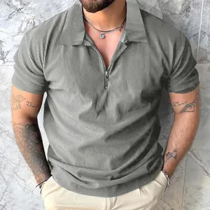 Close-up of men's grey short sleeve zip polo shirt with vertical pleated texture