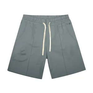 Front view of men's golf shorts featuring vertical stitched pleats and drawstring