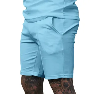 Close-up of men's light blue athletic shorts showing fabric texture and side pockets