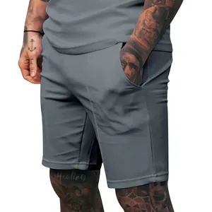 Men's grey athletic shorts detail showing side pocket and comfortable fabric fit
